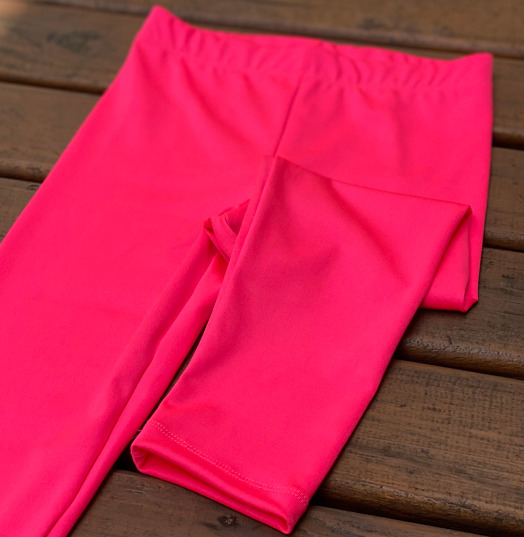 Legging infantil rosa neon dos anos 80 com estampa animal